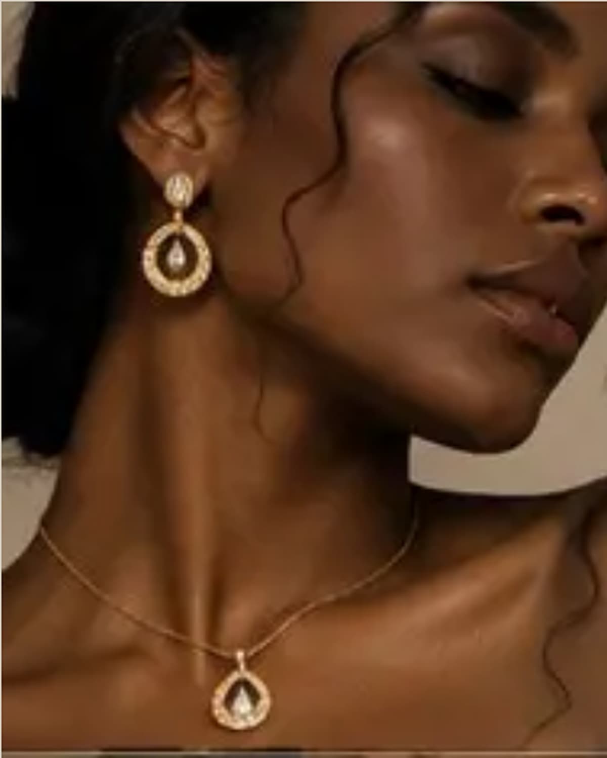 Portrait of a woman with braided hair in a champagne silk slip, soft natural window light