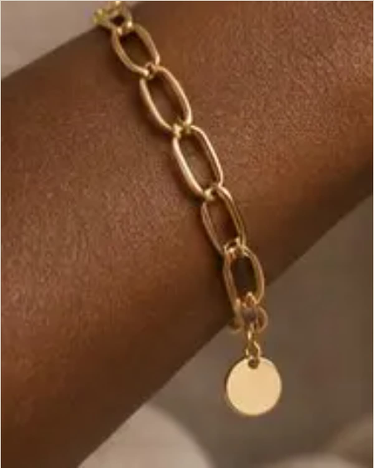 Matching gold earrings and necklace set, worn together